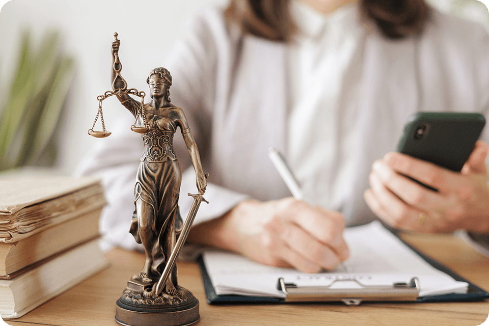 a lawyer looking at law firm reputation management services and taking notes